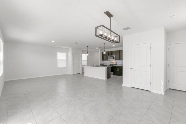 Building Photo - LIKE3 NEW Home For Rent in Avalon Park West!