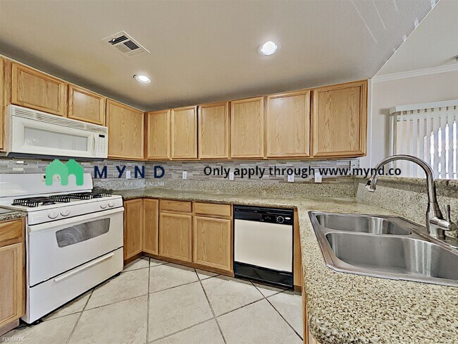 Building Photo - 9580 W Reno Ave
