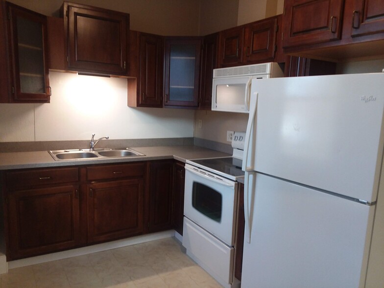 Cherry cabinet and Corian countertop - 1 East Main St.