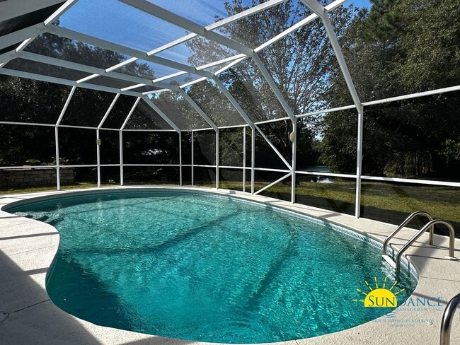 Building Photo - Lakefront home with Enclosed pool centered between Eglin and Hurlburt
