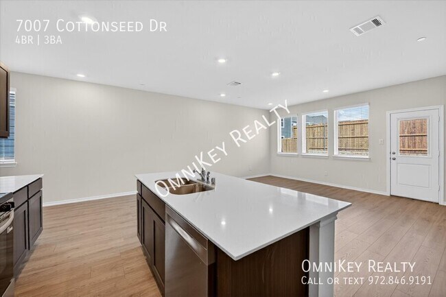 Building Photo - 7007 Cottonseed Dr