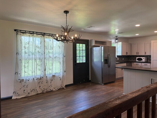 Building Photo - Welcome to country living with a fresh, modern twist.