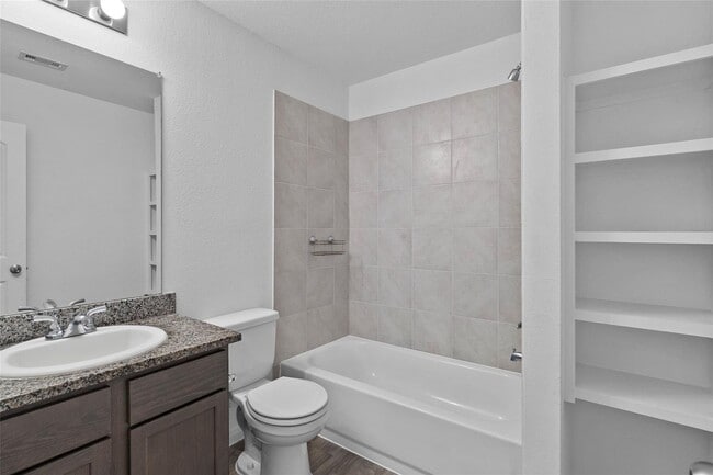 Building Photo - For lease in the sought-after Cedar Point community, this delightful home boasts 1,065 square fee...