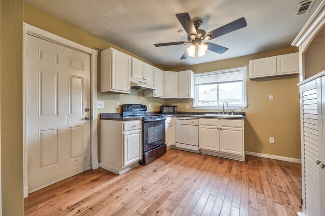 kitchen and door to back - 490 Shawnee Rd