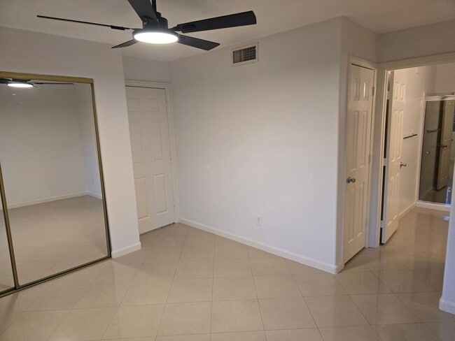 Building Photo - UPGRADED CONDO READY TO MOVE INTO!