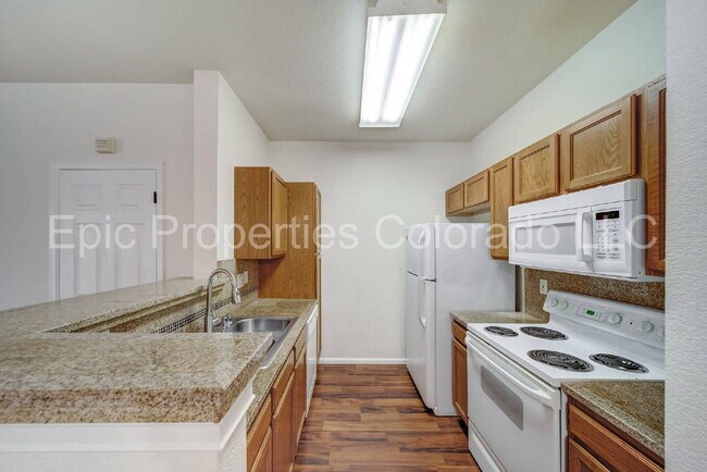 Building Photo - First Floor Corner 2 bed/2bath unit by Buckley SFB! Deeded Parking Right in Front!