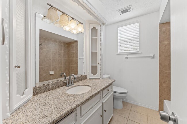 Building Photo - 9611 Hearthwood Dr