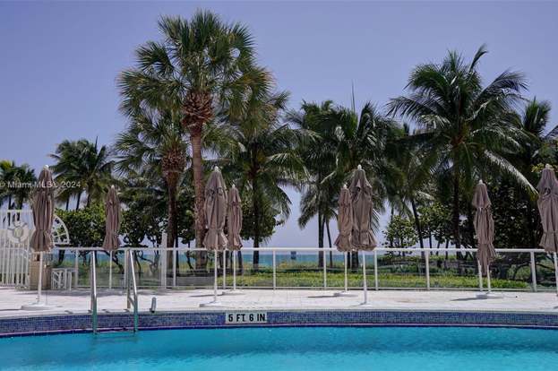 Building Photo - 10155 Collins Ave