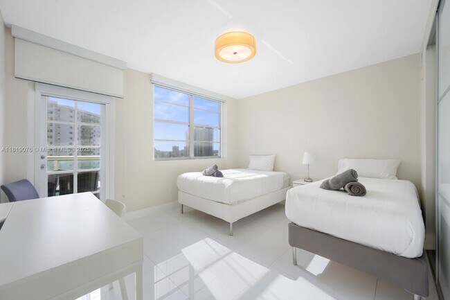 Building Photo - 19370 Collins Ave