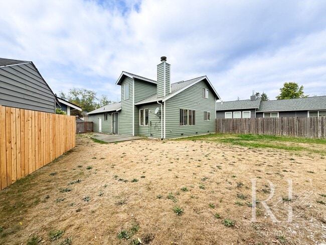Building Photo - Spacious 4-Bedroom Home with Fenced Yard &...