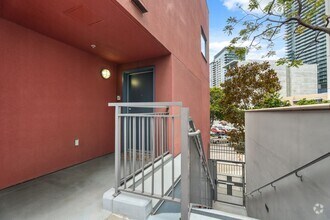 Building Photo - Modern 2-Bedroom Condo with Premium Amenit...