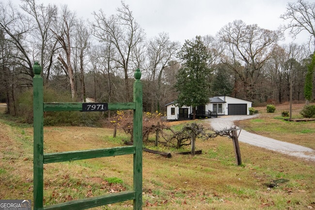 Building Photo - 7971 Roosterville Rd