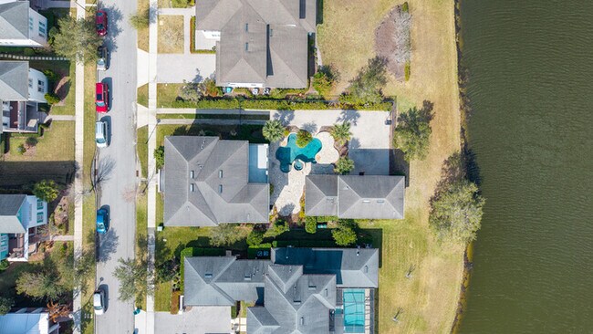 Building Photo - Luxury Waterfront Pool Home in Laureate Park | 4BR + Water Views