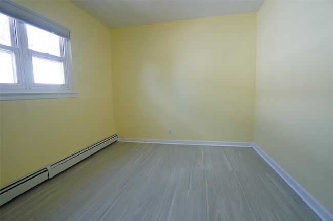 Building Photo - 203-12 42nd Ave