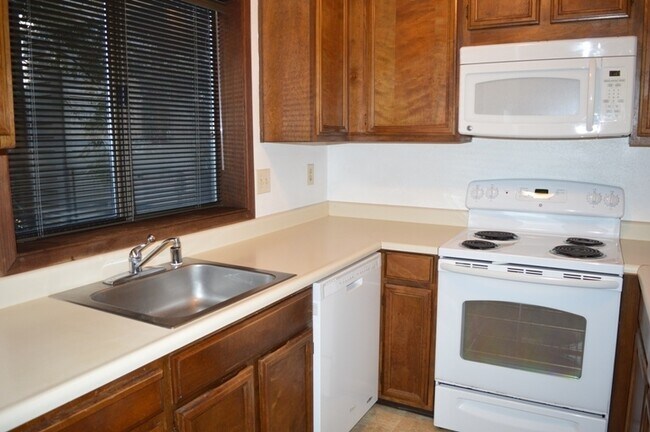 Building Photo - Spacious and Conveniently Located with Private Patio and Parking