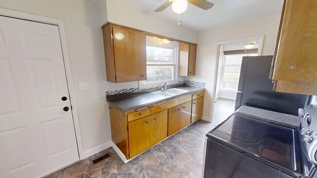 Building Photo - Sun-Drenched Mt. Tabor Home with Massive Yard & Oversized Shop-Garage!