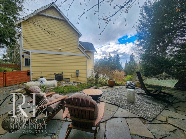 Building Photo - Light-Filled View Home with Vaulted Ceilings & Warm Wood Finishes