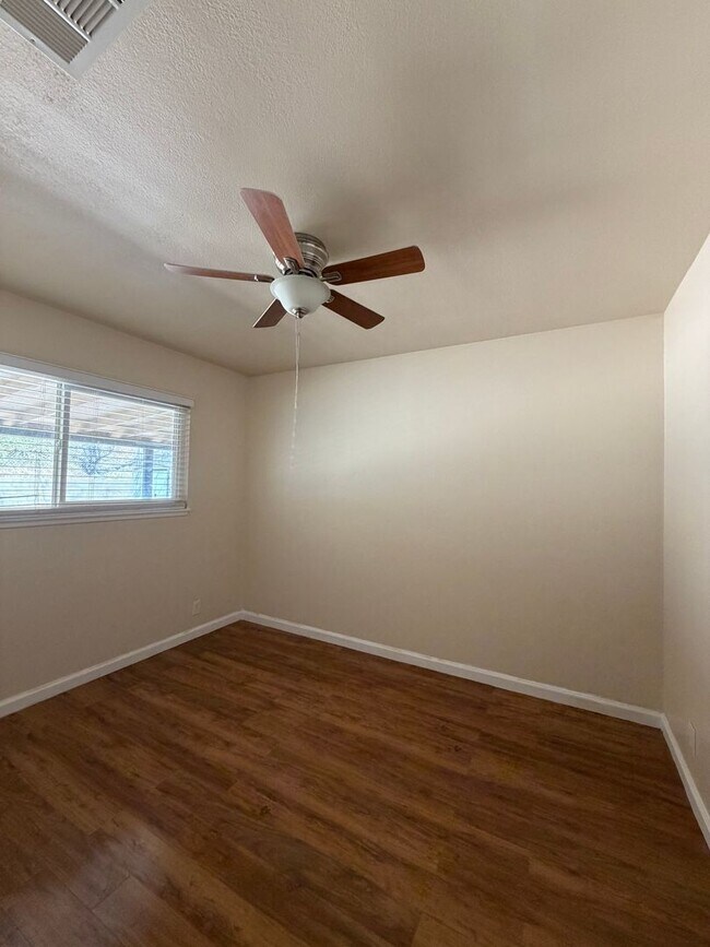 Building Photo - 3 Bedroom 2 Bathroom House with Central A/C , 2 Car Garage and Beautiful Backyard with Covered Patio