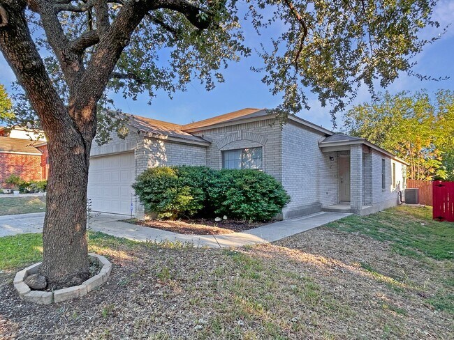 Building Photo - Northeast 3/2 with New Bedroom Floors & Covered Patio