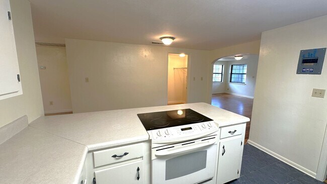Building Photo - MIDTOWN 3/2 w/ Beautiful Wood Floors, Newer Paint, Inside Utility Area, & More! $1695/month Avail...