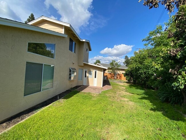 Building Photo - Gorgeous Home With Multiple Living Rooms, Two Primary Suites, Fruit Trees, And More!