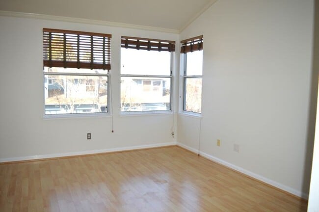 Building Photo - Spacious Three-Bedroom Two-Story Townhome with Garage and Private Yard