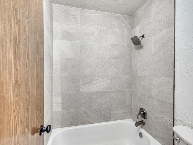 Building Photo - 4 Bedrooms - 3 Bathrooms - 3 Car Garage - ...