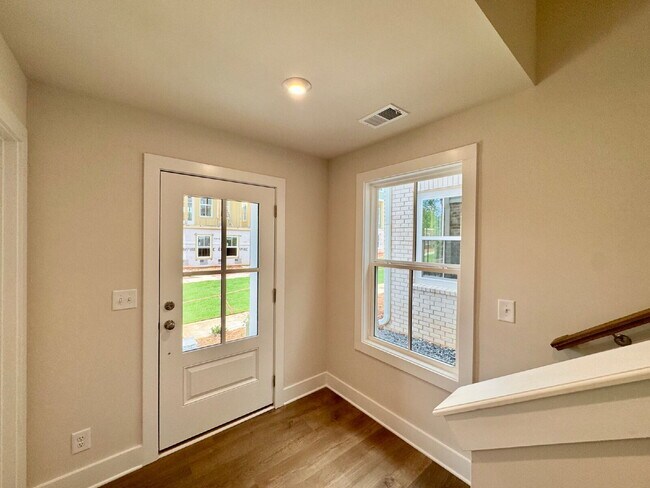 Building Photo - Your Alpharetta Retreat Awaits – Elegant T...