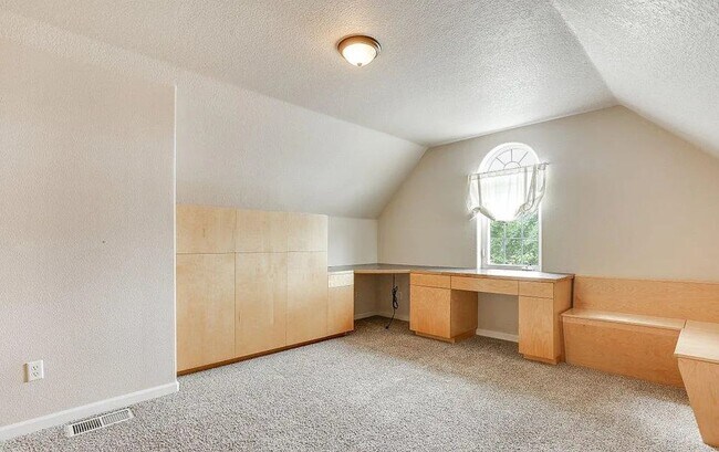 Building Photo - Spacious Four-Bedroom Home with Gourmet Kitchen, Multiple Living Areas, Loft, and Beautifully Lan...