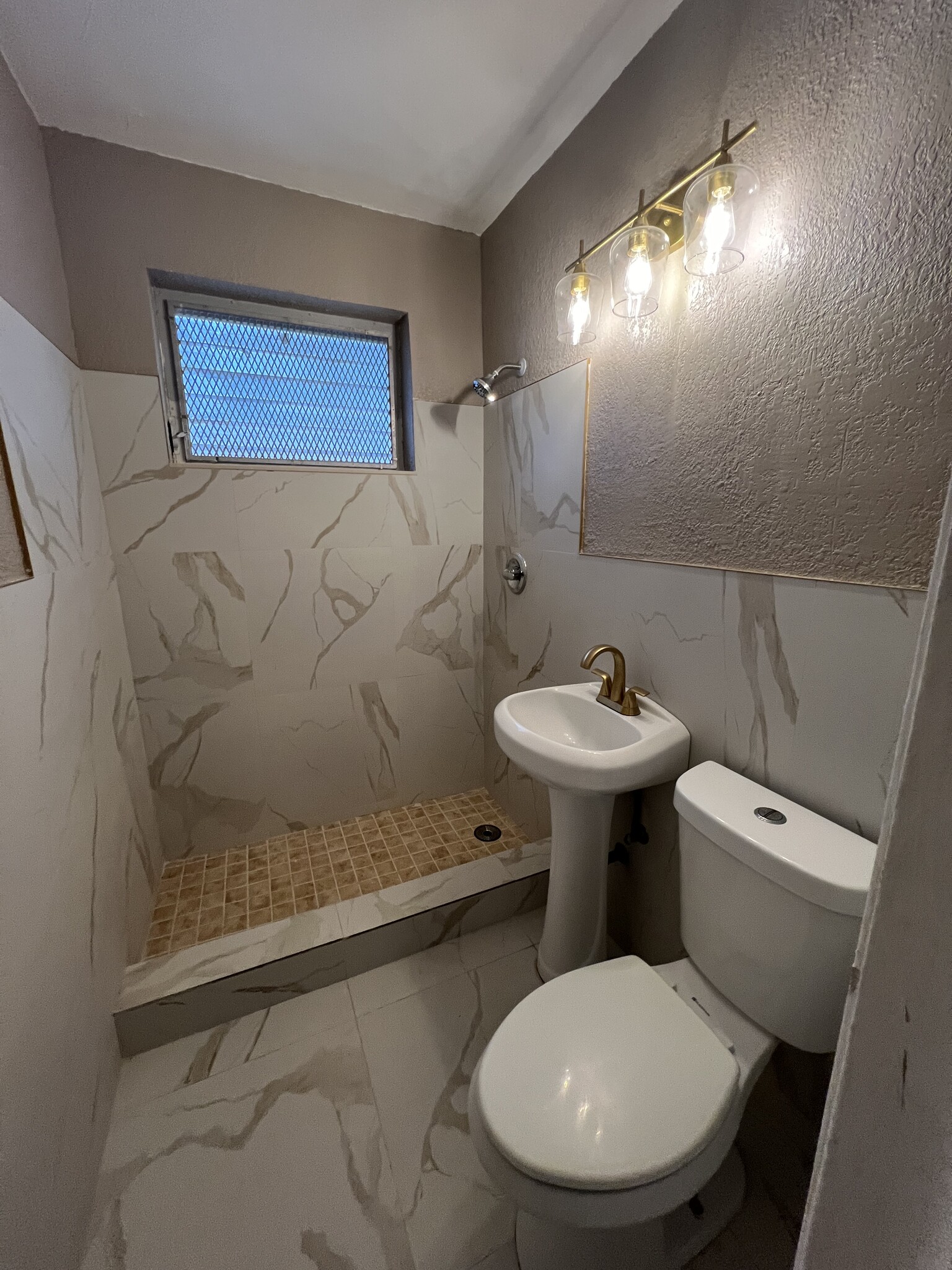 Newly renovated modern Bathroom. - 1864 NW 93rd St