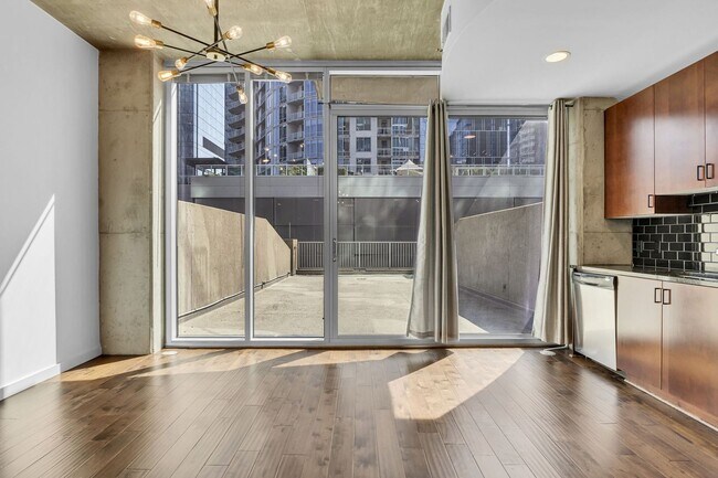Building Photo - Stunning condo in the heart of SoBro at the Encore! Beautiful 1 bed, 1 bath on the amenity floor ...