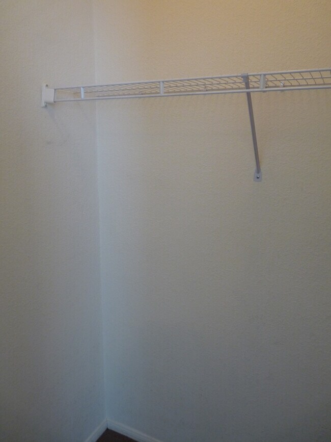 Building Photo - GATED 2 BEDROOM, 2 BATH CONDO IN JASMINE RANCH COMMUNITY