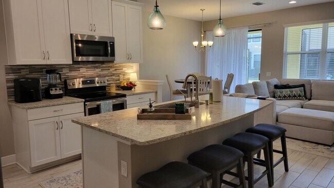 Building Photo - Annual UNfurnished newer 3/ 2 /12 townhome off SR-70 in gated community