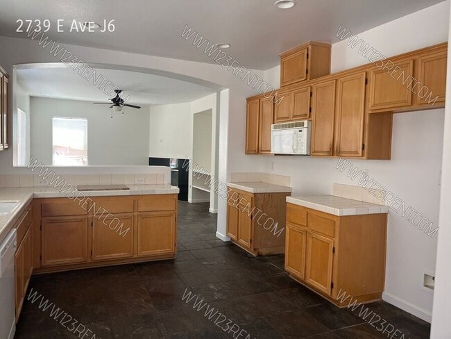 Building Photo - 2739 E Ave J6