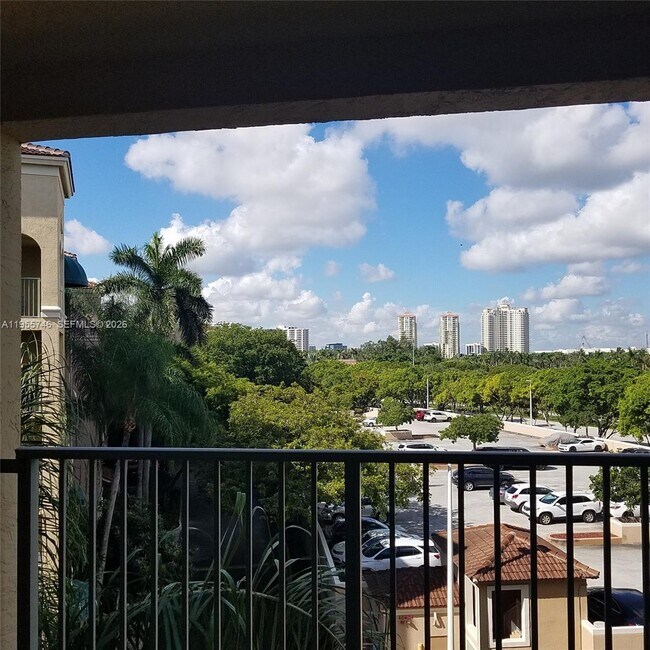 Building Photo - 19999 E Country Club Dr