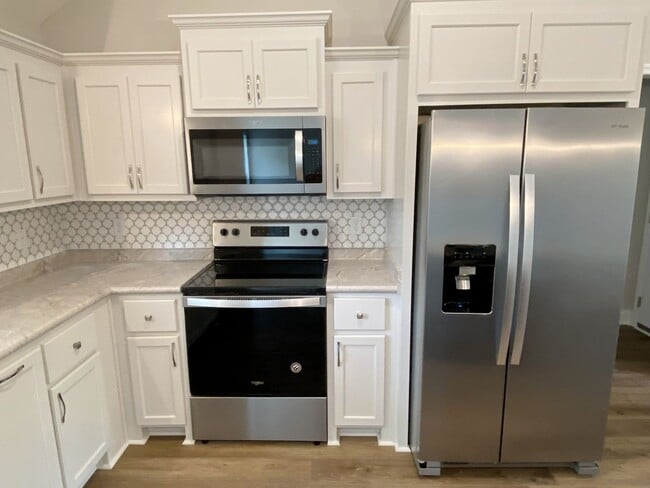 Building Photo - $500 Move-in Discount! Modern 4-Bedroom Home with Fenced Yard Near Moody AFB