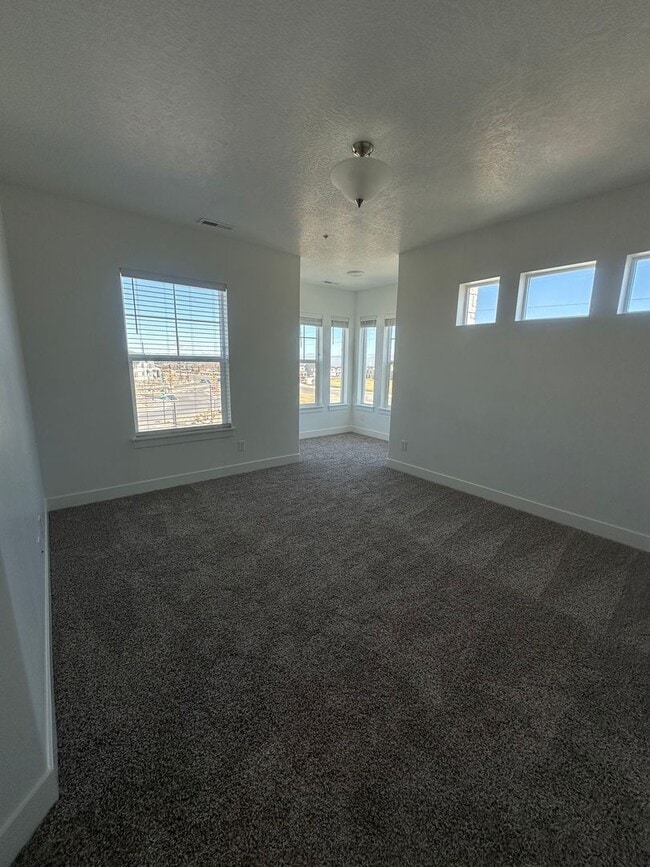 Building Photo - Brand New 3 Bed Condo with Resort-Style Amenities & Included Internet!