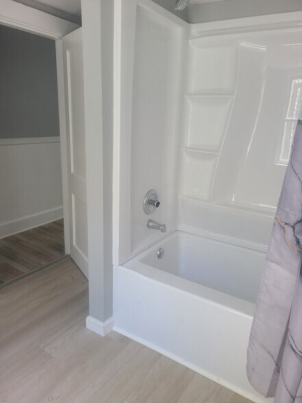 new tub and shower uni - 52 Main St