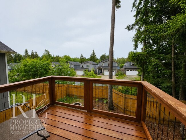 Building Photo - Spacious 3-Story Home with Flexible Living Space, Heat Pump & Private Deck Retreat