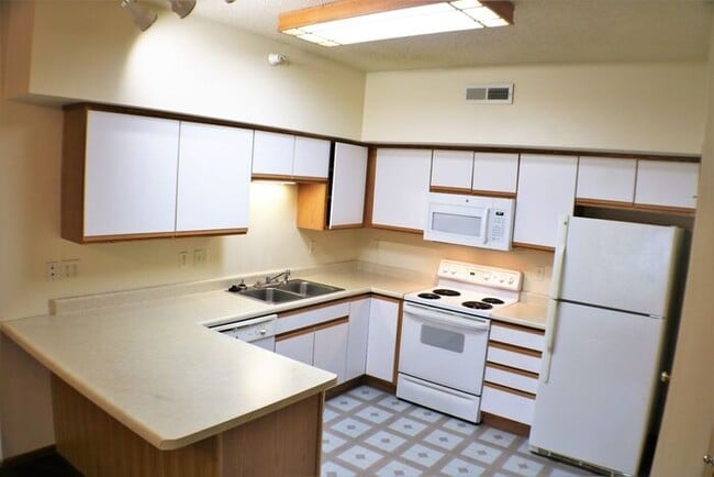 Building Photo - $1,250 | 2 Bedroom, 1 Bathroom Condo | No Pets | Available for an August 1st, 2026 Move In!