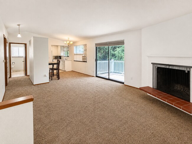 Building Photo - Beautiful Split-Level Home with Fireplace, Deck, Garage, and EV Charger