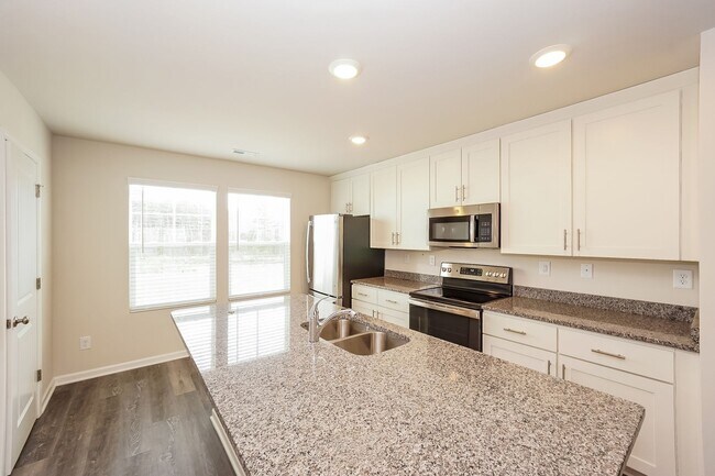 Building Photo - 3-Bedroom, 3.5 Bath Townhome for Rent in Mooresville, NC | Attached Garage & Modern Kitchen