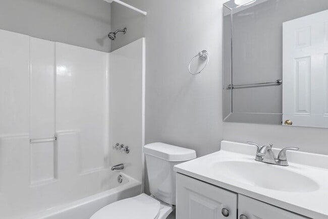 Building Photo - NW Home - Updated Kitchen and Bathrooms, Wood Laminate Flooring, Deck, Must See!