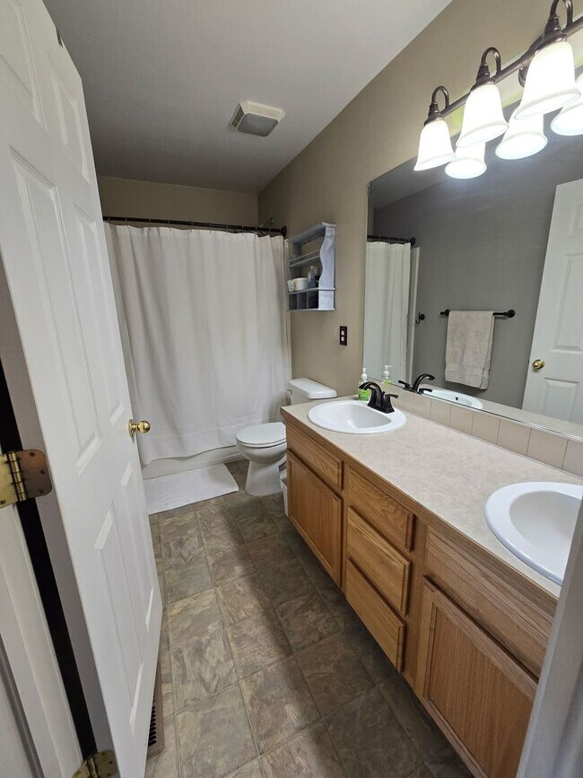 Building Photo - Spacious 5B/3B with Finished Basement Now Available!