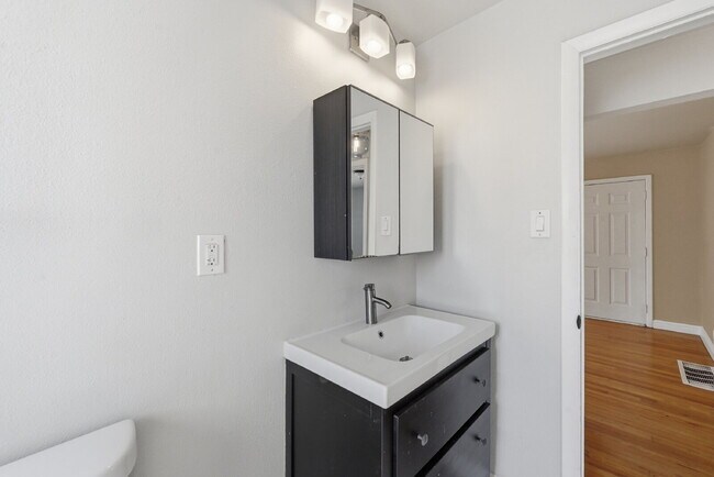 Building Photo - $2,140.95 -  2 bed, 1 bath located in Denver with a big backyard and In Unit Laundry!
