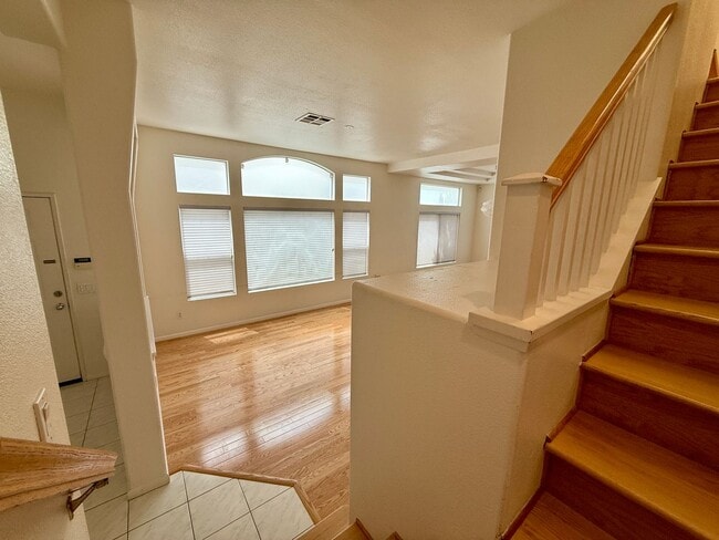 Building Photo - Spacious 3 Bedroom 2.5 Bath Townhouse with Private Garden Patio & a Community Pool/Spa! Attached ...