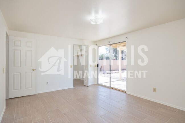 Building Photo - Cozy Home with No HOA and a Large NO Maintenance Backyard
