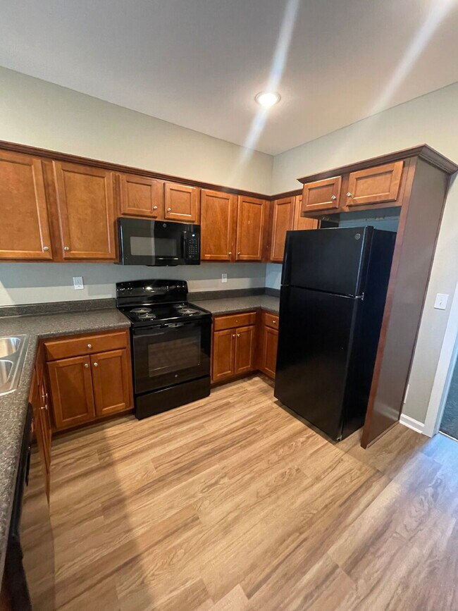 Building Photo - Spacious New 3BR/3BA Condos – Pool & Gym Amenities