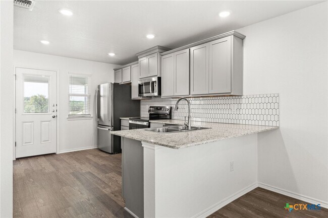 Building Photo - 203 Monty Ave