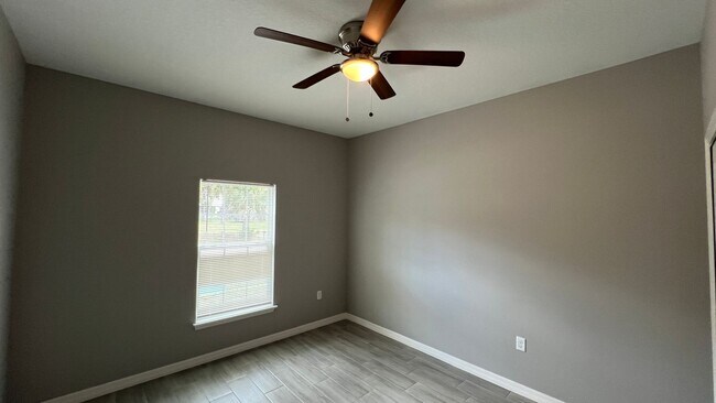 Building Photo - Smart & Stylish 3BD/2BA Palm Bay Home – Modern Upgrades, No Water Bills!